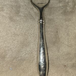 Vintage Nautica stainless steel bottle opener barware